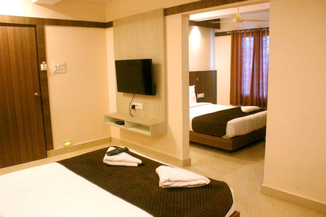 Hotel Sakura Inn Хосур Экстерьер фото