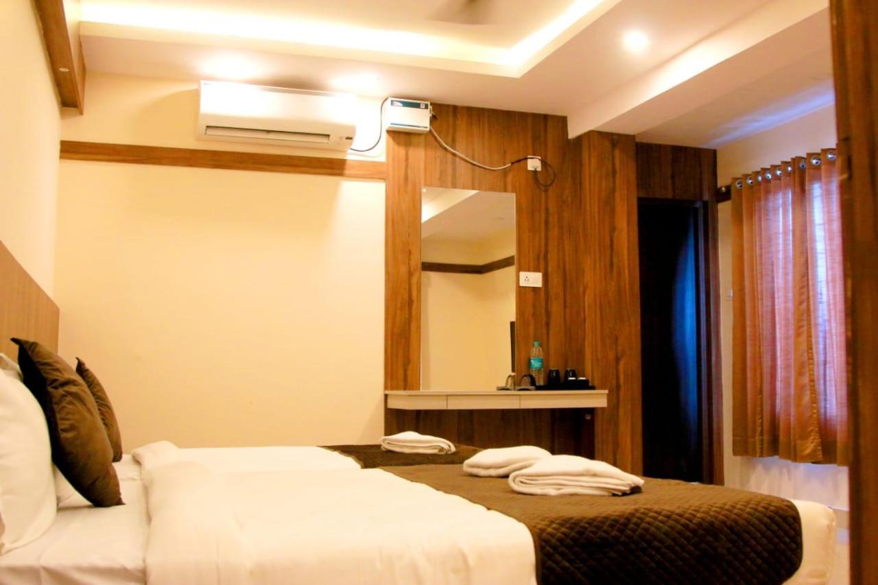Hotel Sakura Inn Хосур Экстерьер фото
