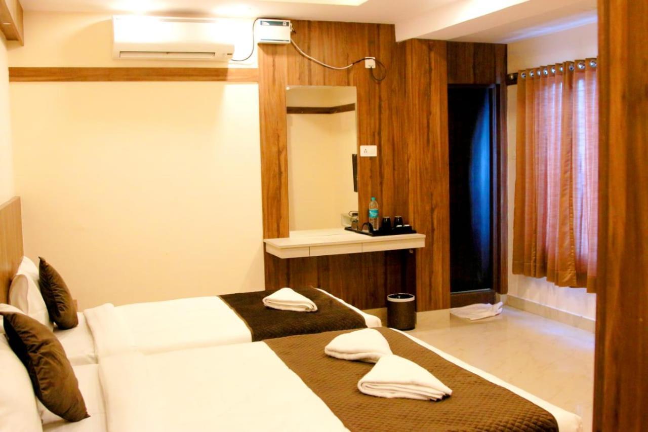 Hotel Sakura Inn Хосур Экстерьер фото