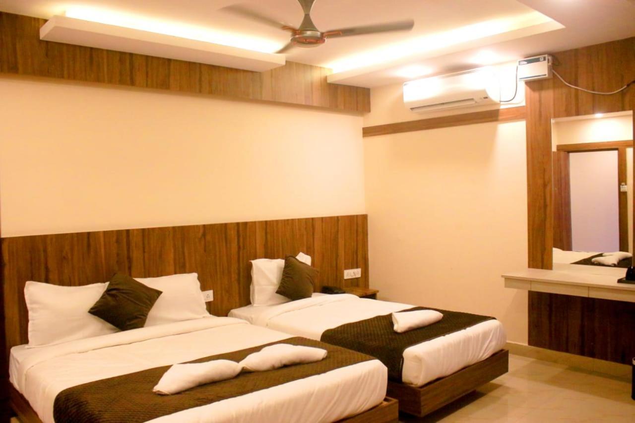 Hotel Sakura Inn Хосур Экстерьер фото