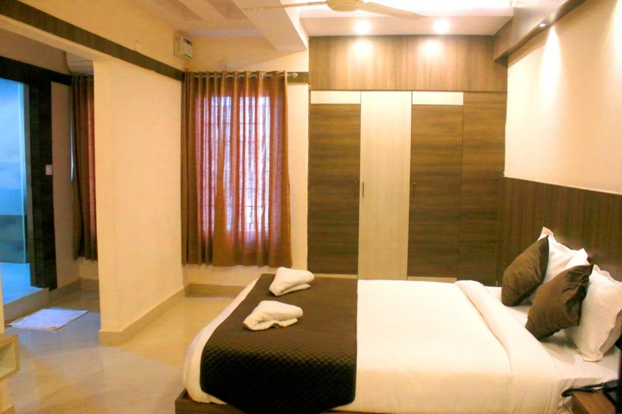 Hotel Sakura Inn Хосур Экстерьер фото