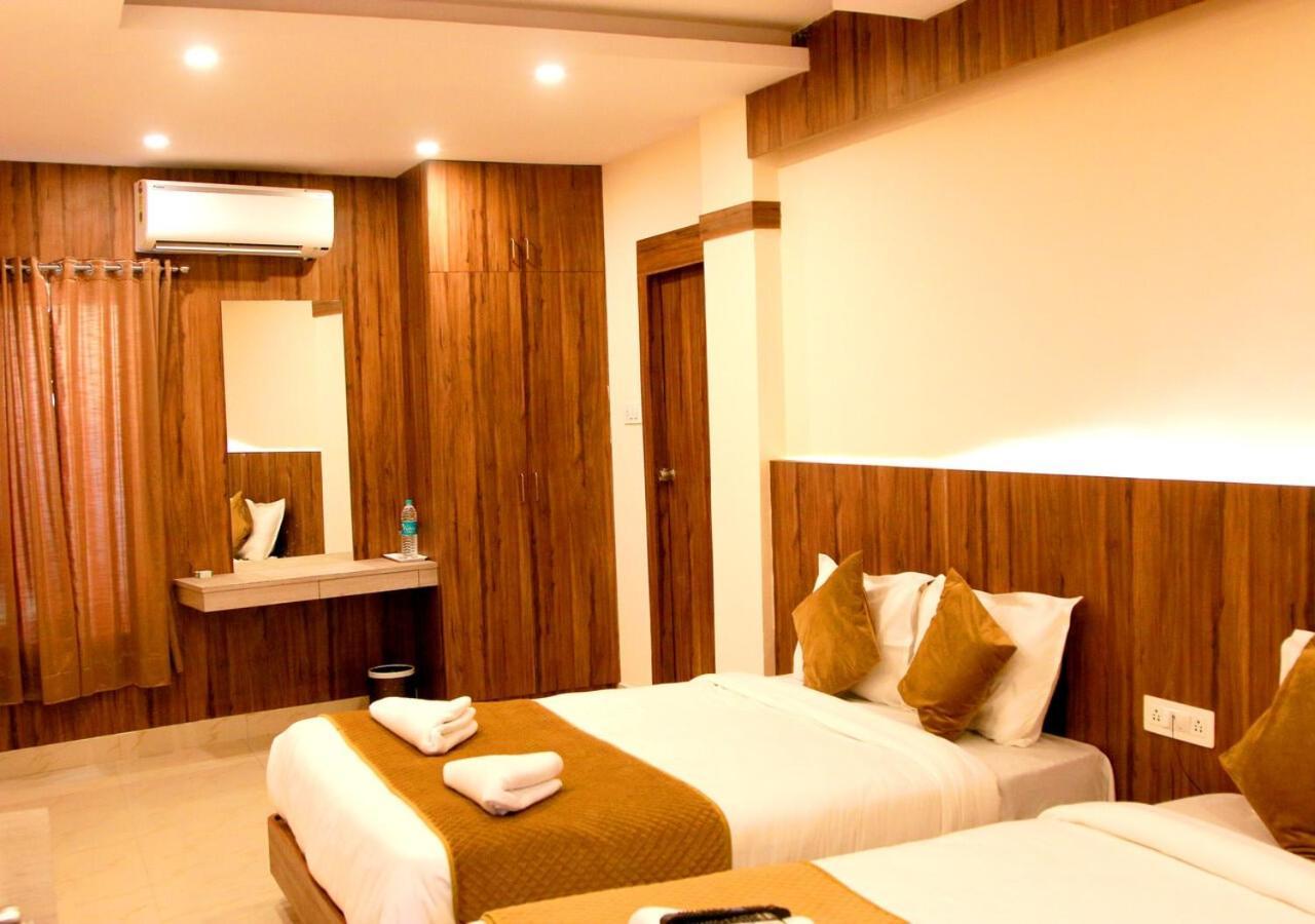 Hotel Sakura Inn Хосур Экстерьер фото
